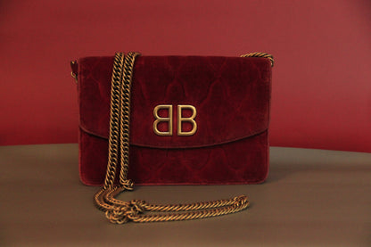 Sac à main Balenciaga 'BB Chain wallet on chain' en velours bordeaux